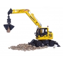 Komatsu PW148-10 avec benne preneuse